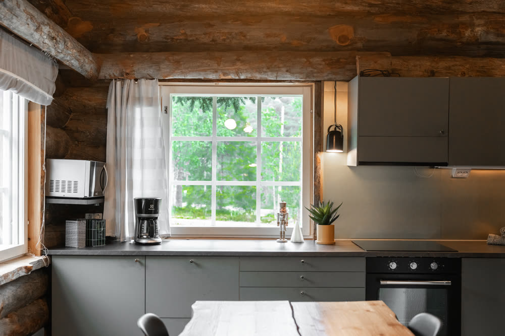 Fitted kitchen with induction hob and oven